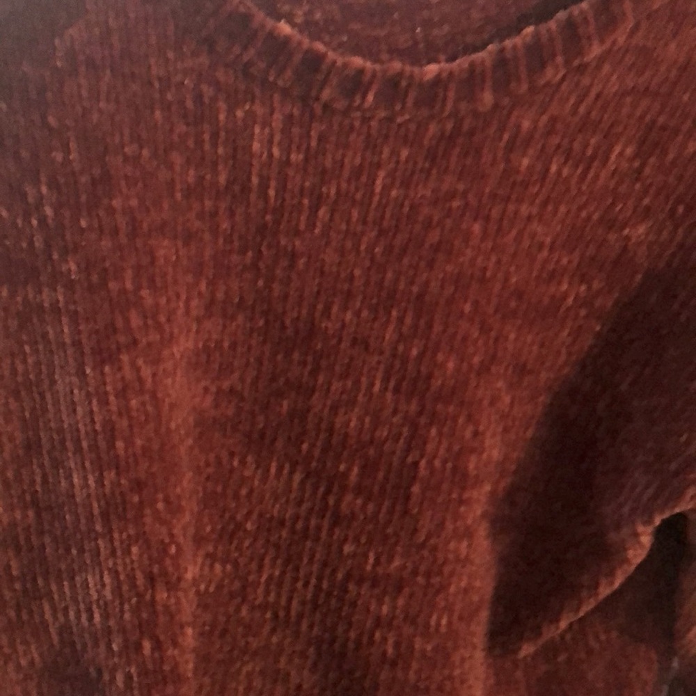 A pink sweater